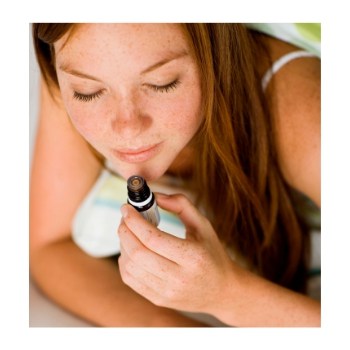 doterra girl with oil